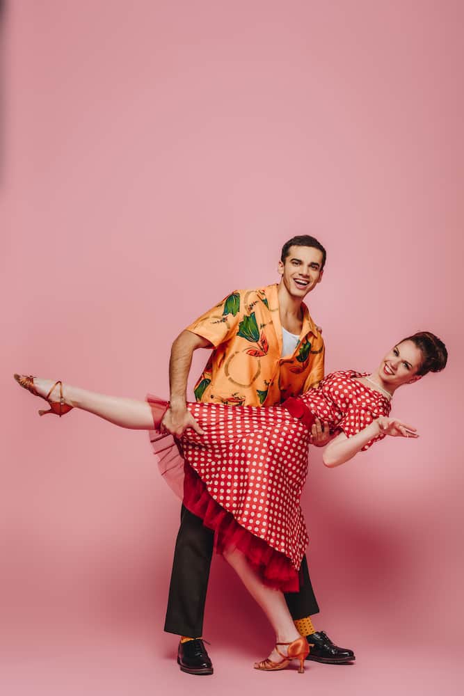 swing dancing couple polka dot dress