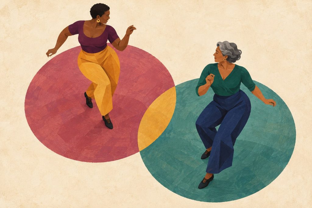 Two women dance salsa shines apart on overlapping painted circles while facing each other